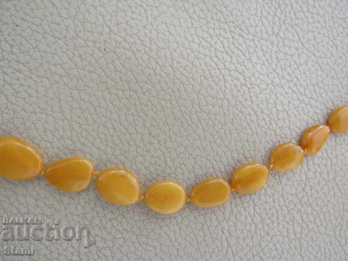 Delivery of Women's circle necklace made of premium Baltic amber