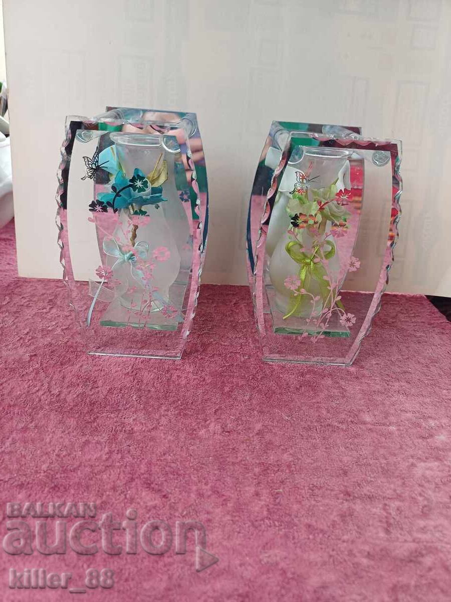 Vases in glass casing