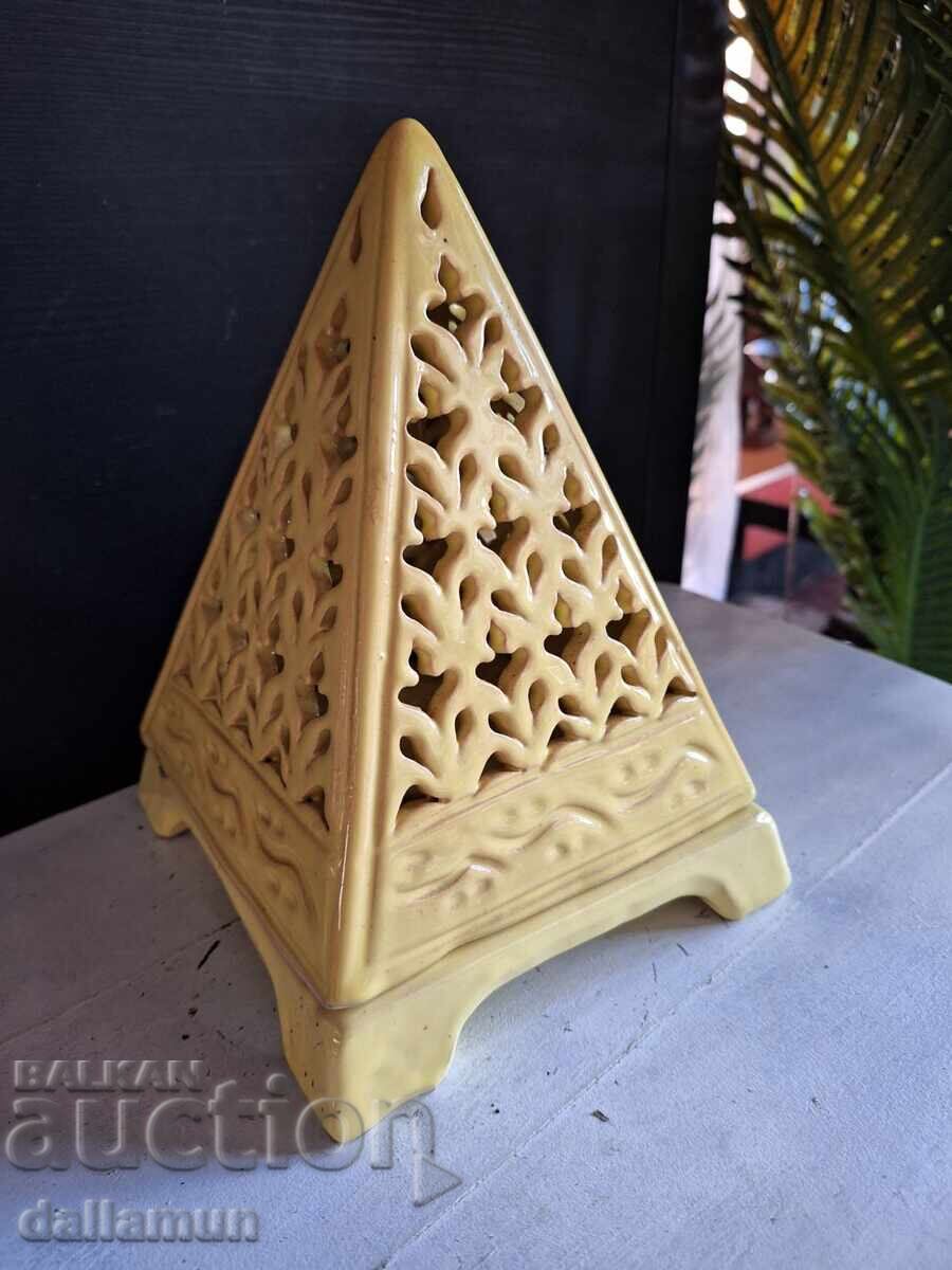 Old decorative pyramid candlestick