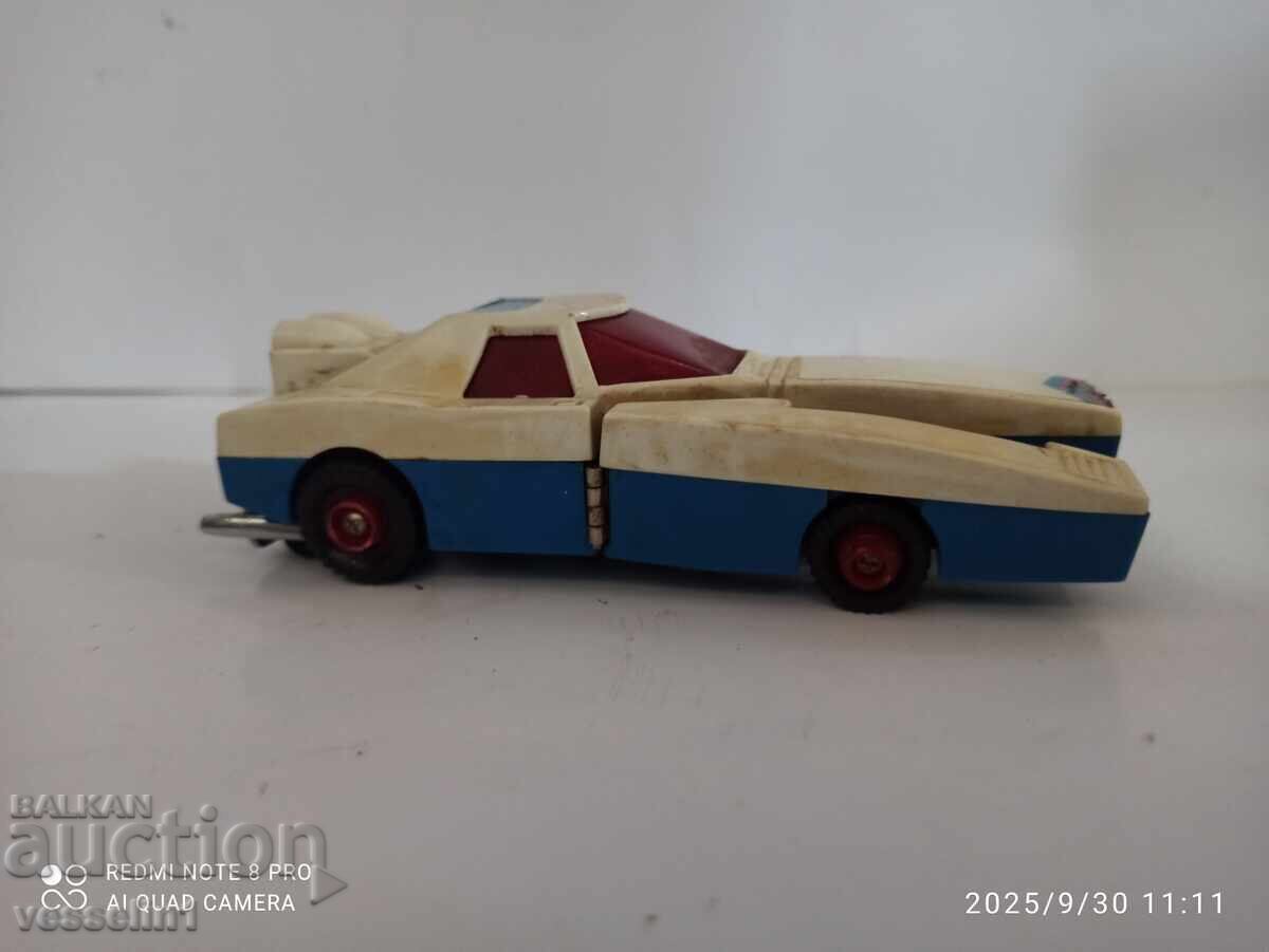 Old battery-powered toy car, rocket, lunar rover, working