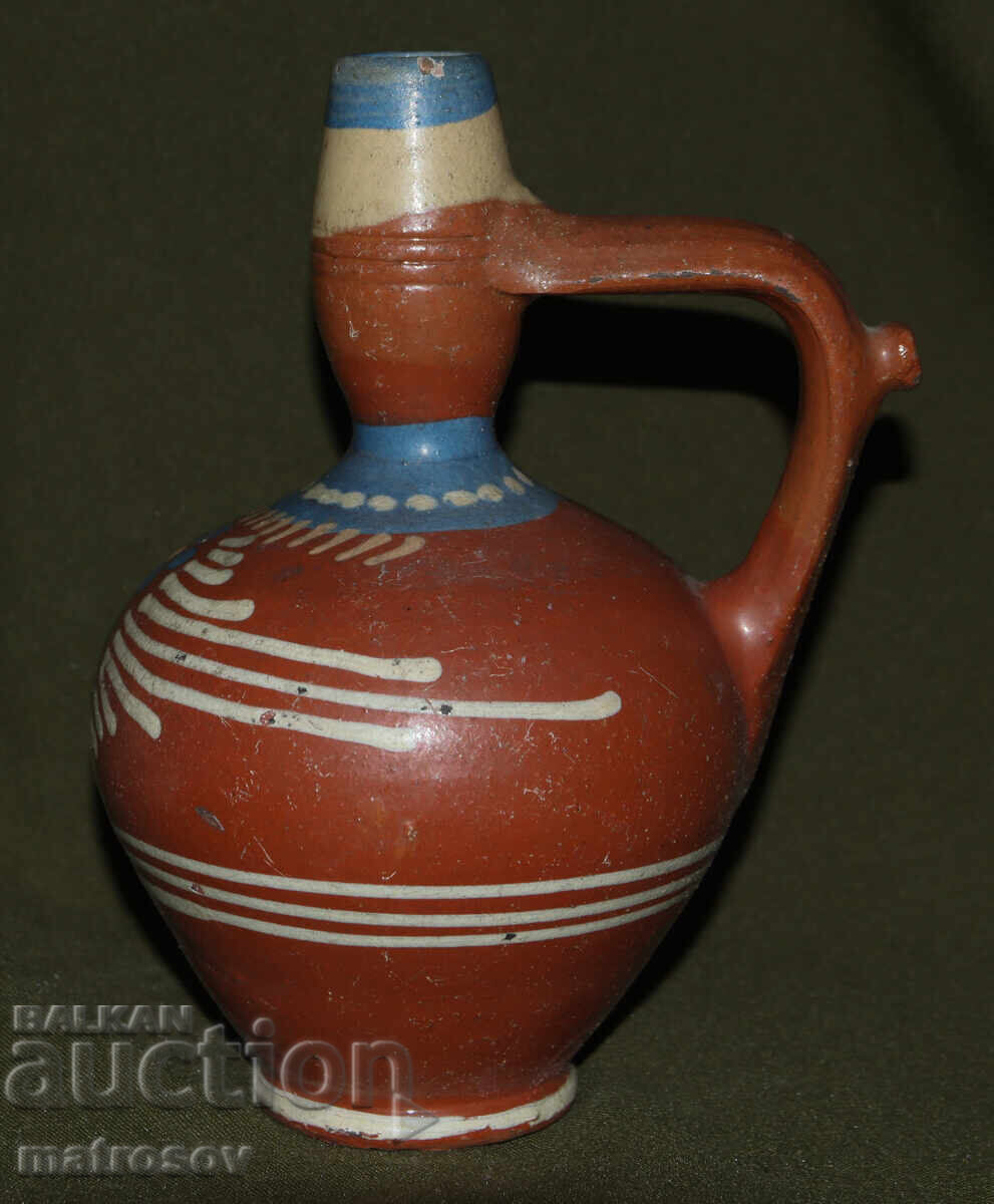 Auction  Traditional ceramic jug, hand-painted