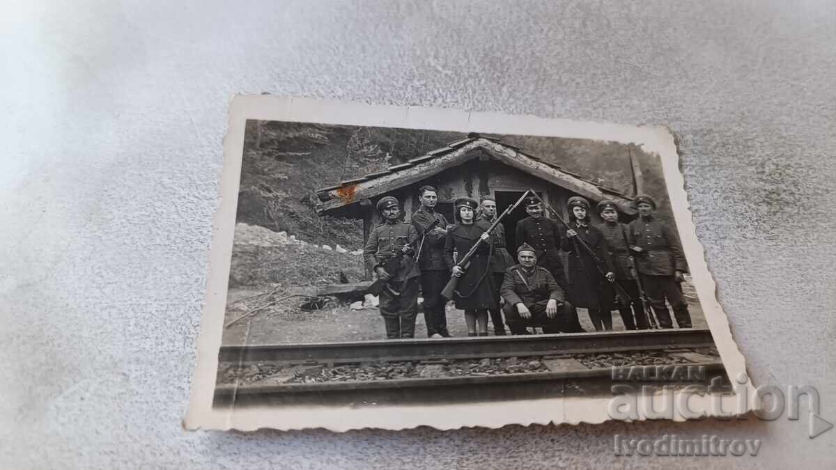 Photo of Soldiers and Two Young Girls with Rifles with Bayonets Photo of Soldiers and Two Young Girls with Rifles with Bayonets