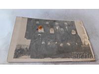 Photo of Two Men and Clergy