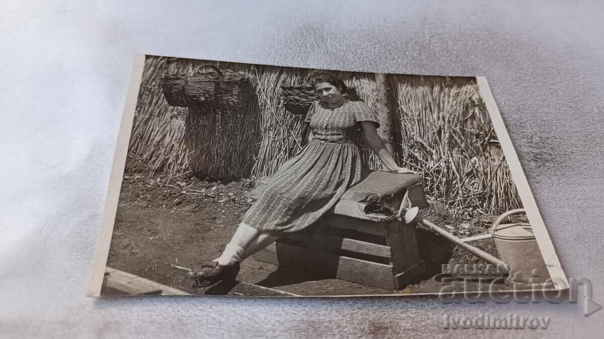 Photograph Young woman in the yard 1945 Photograph Young woman in the yard 1945