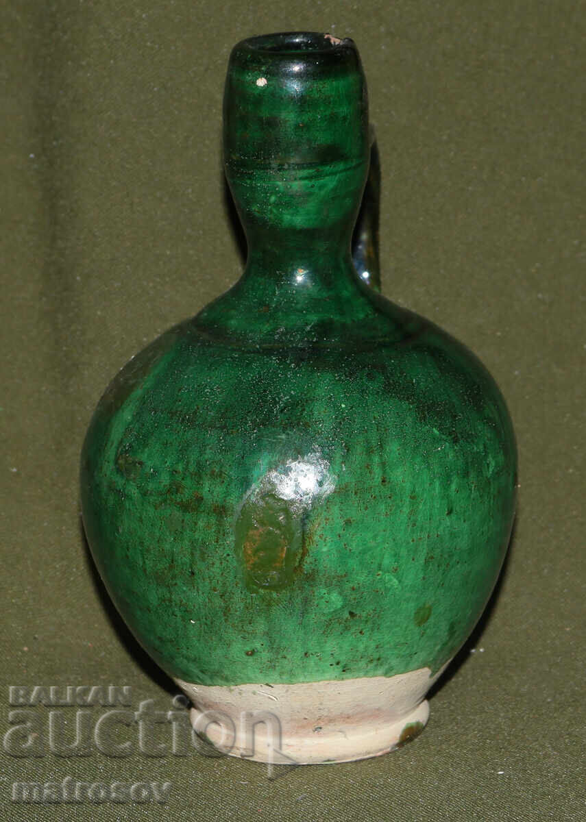 Auction  Traditional ceramic jug, hand-painted