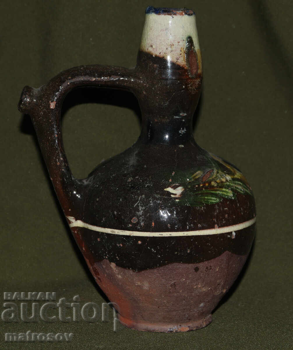 Auction  Traditional ceramic jug, hand-painted