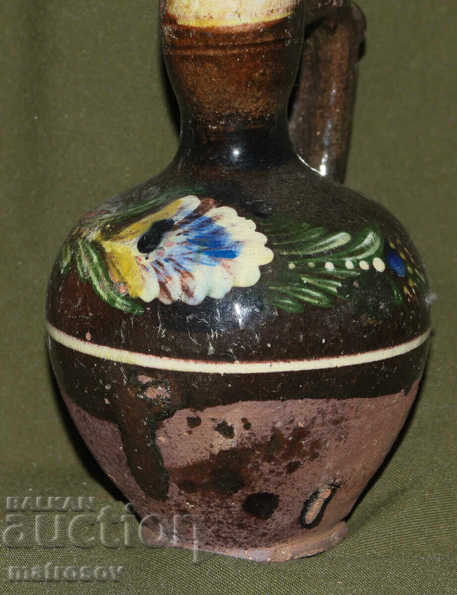 Traditional ceramic jug, hand-painted