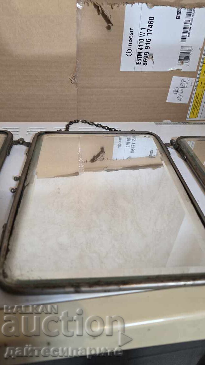 Delivery of Old mirror, folds into three parts