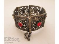 Old women's bracelet with ornaments costume jewelry