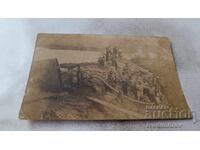 Fotografie Bărbați lângă pompă de apă