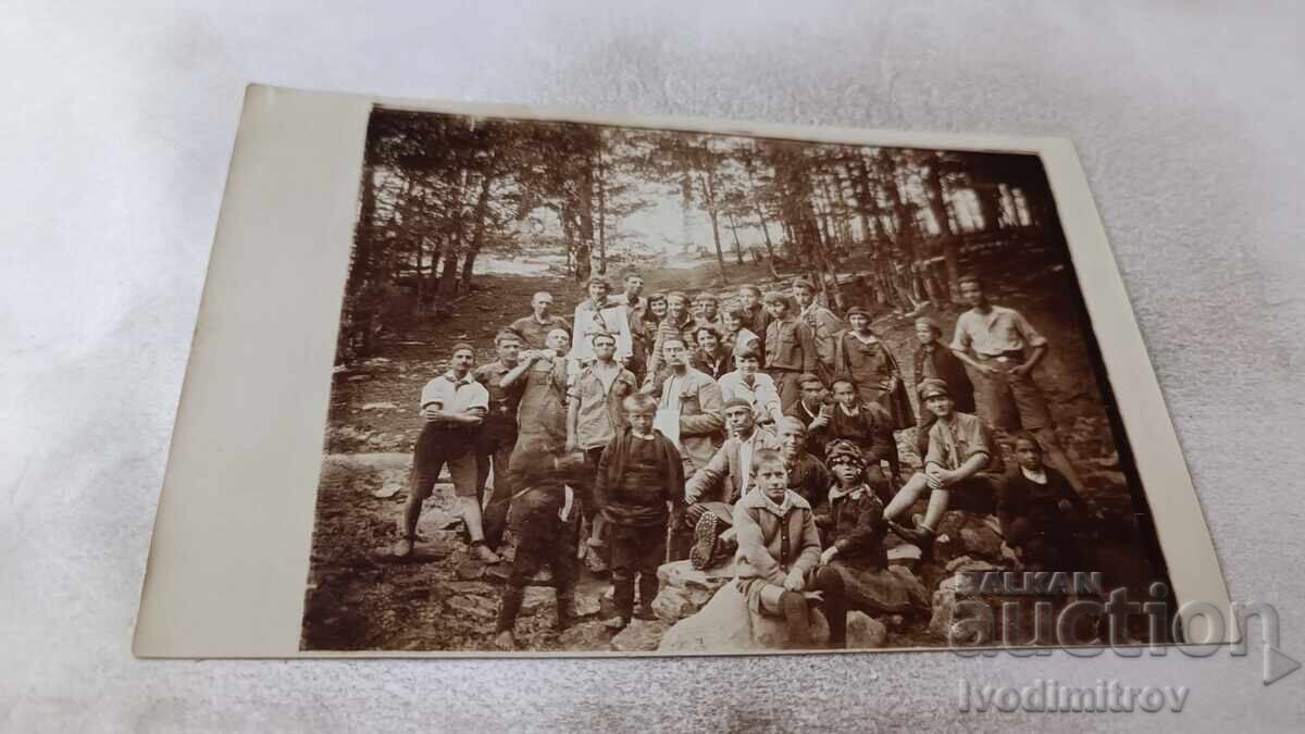 Photo of Chumerma: Boys and girls around the fountain near the hut