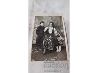 Photograph of a woman, boy, and girl on Petkovden (St. Petka's Day) 1933