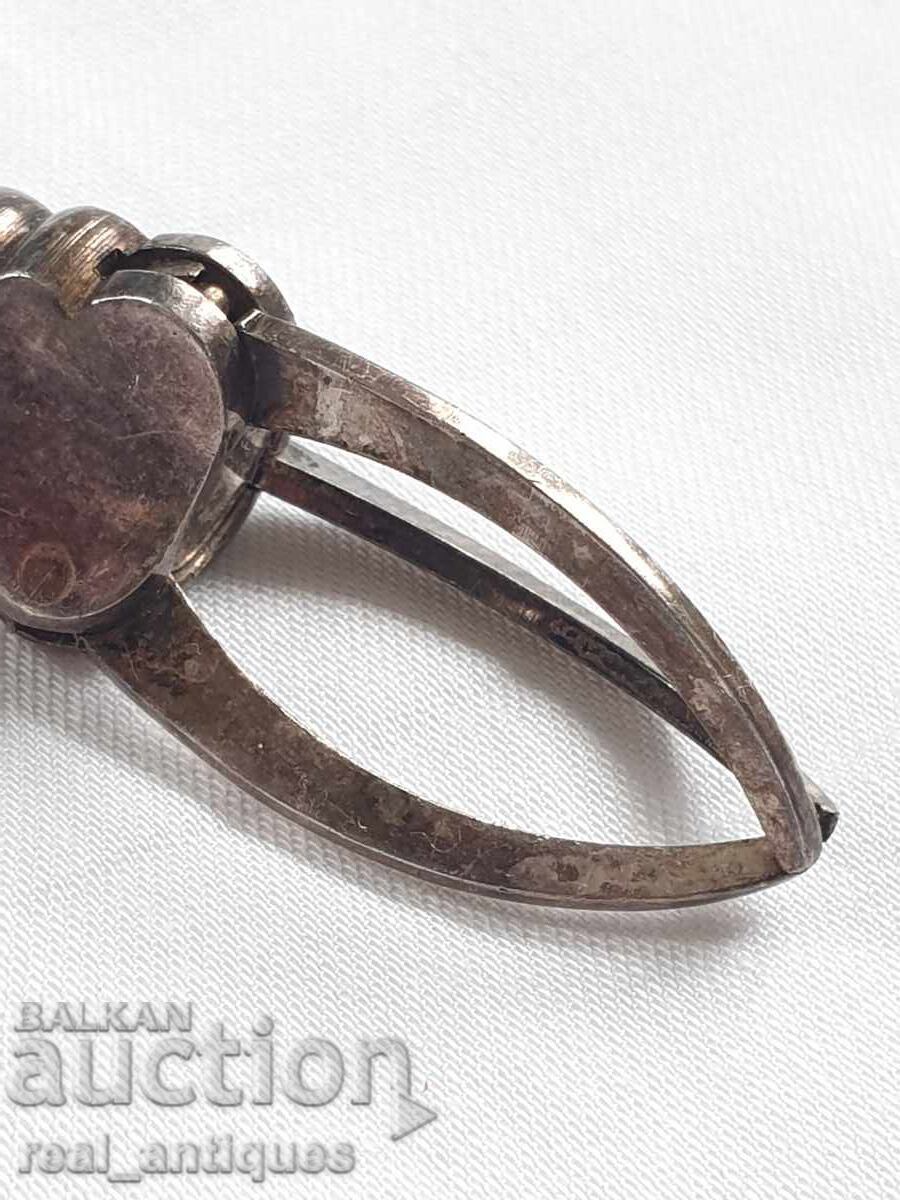 Доставка на Посребрена щипка за лед