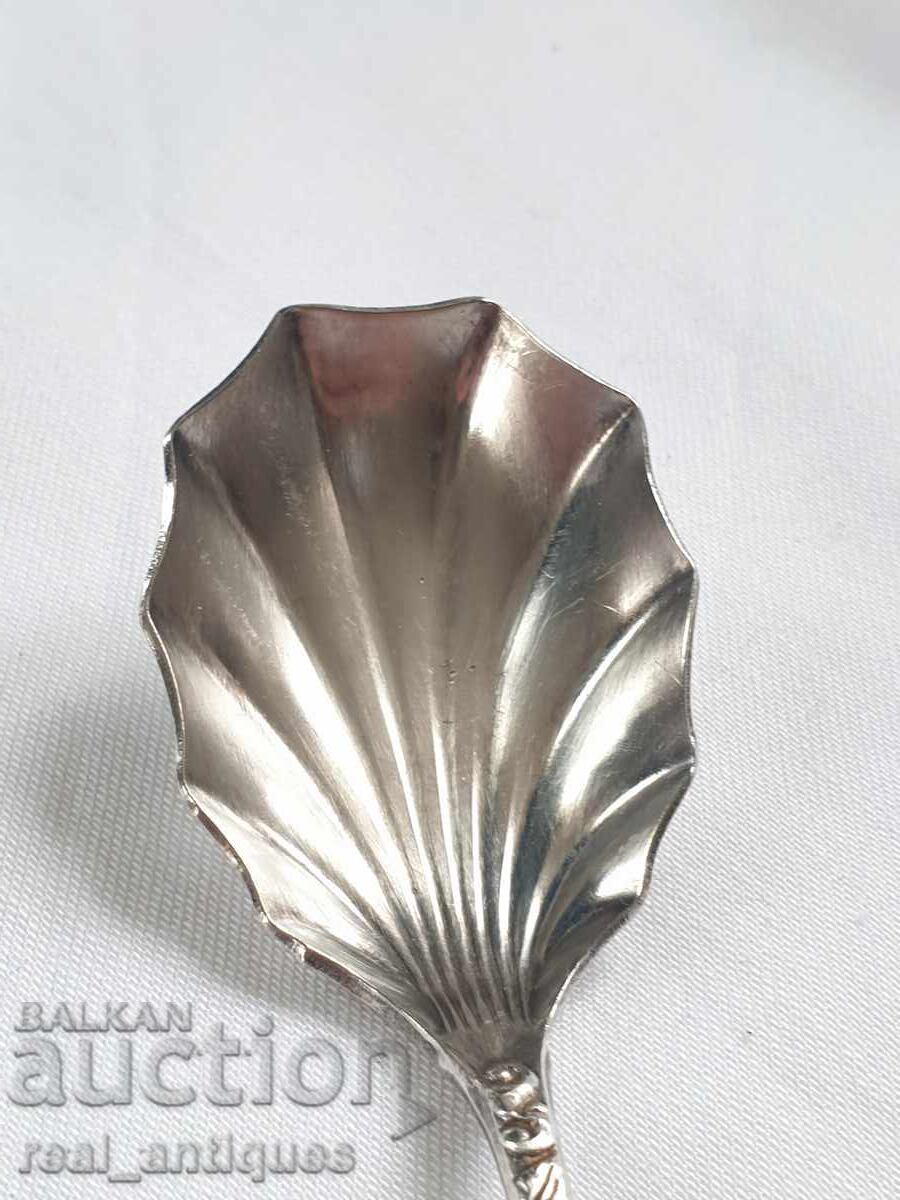 Auction  A silver spoon