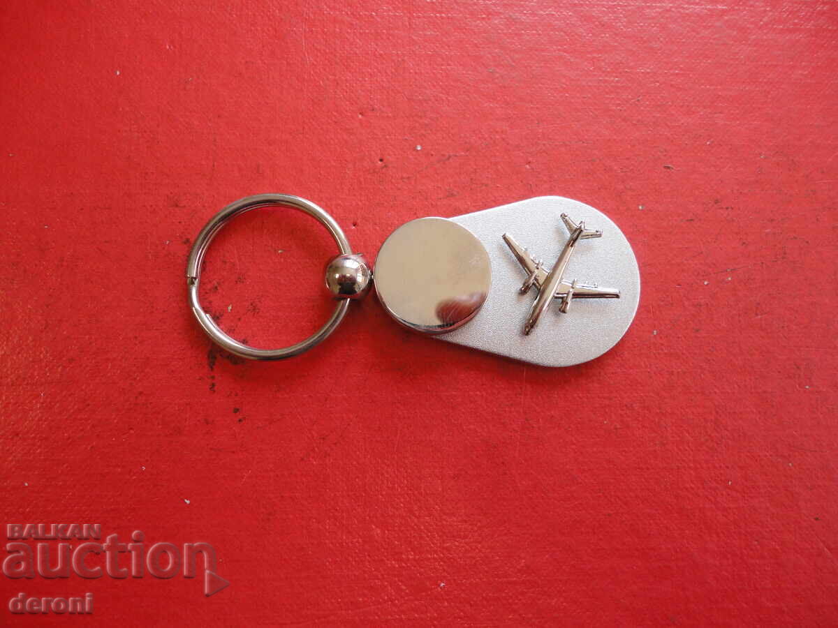 Livrarea Breloc avion unic Livrarea Breloc avion unic