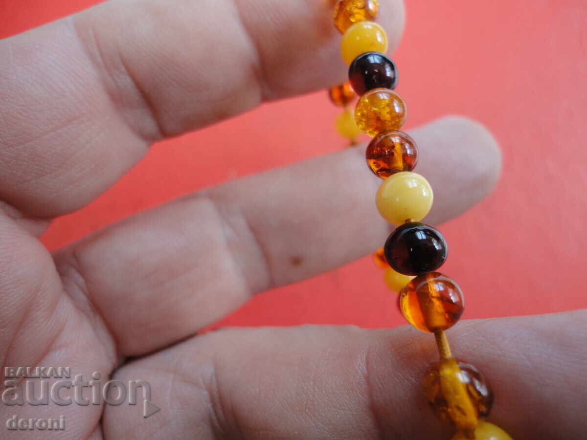 Доставка на Страхотна гривна от натурален кехлибар