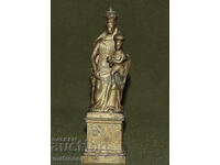 Metal decorative figure of the Virgin Mary with the Child