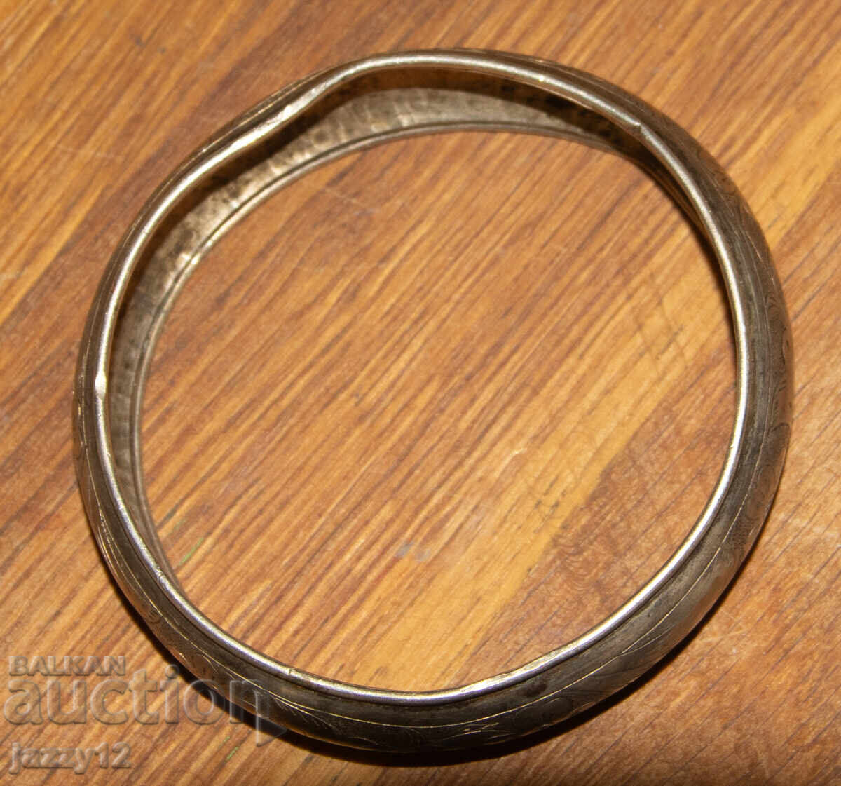 Licitație Brățară veche de argint cu motive florale Licitație Brățară veche de argint cu motive florale