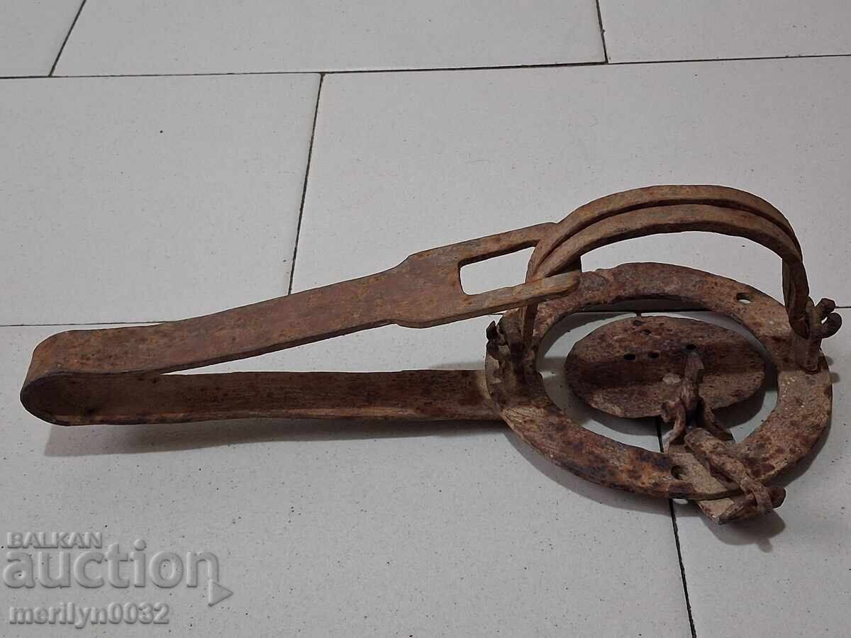 Auction  Old hand forged trap, wrought iron