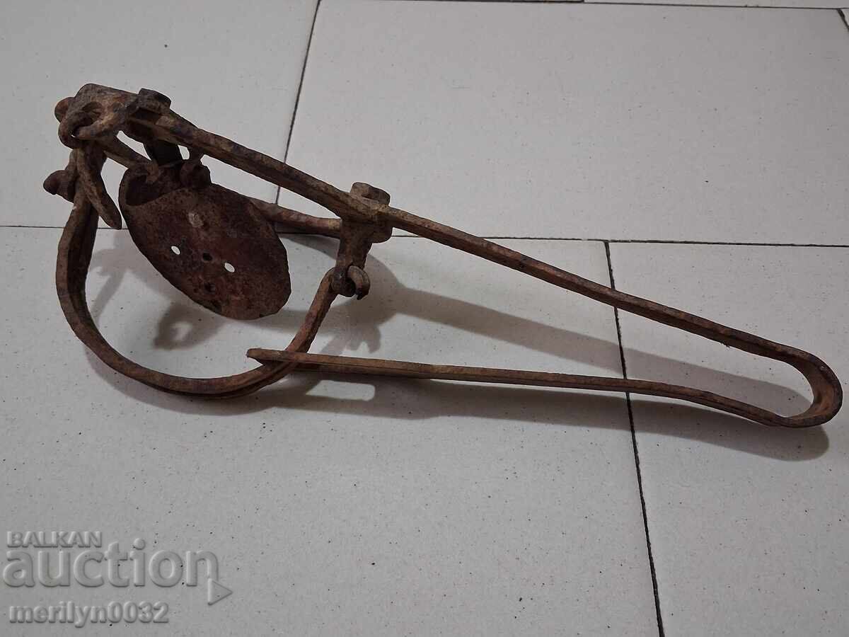 Delivery of Old hand forged trap, wrought iron