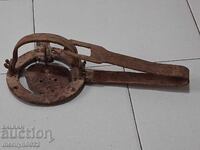 Old hand forged trap, wrought iron