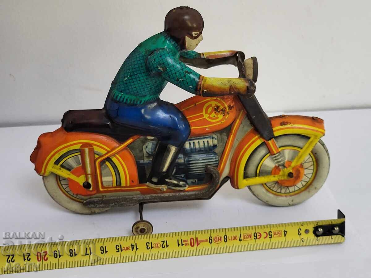 Livrarea Jucărie veche de tablă, motocicletă