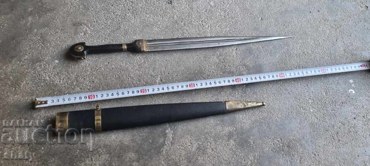 Old kama with horn features Old kama with horn features