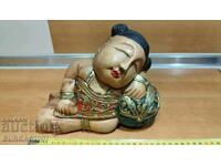 Old wooden figure, geisha