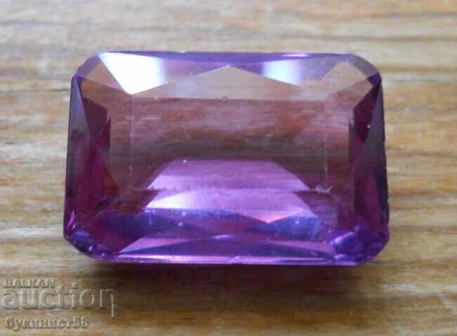 Faceted synthetic alexandrite Faceted synthetic alexandrite
