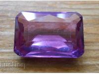 Faceted synthetic alexandrite