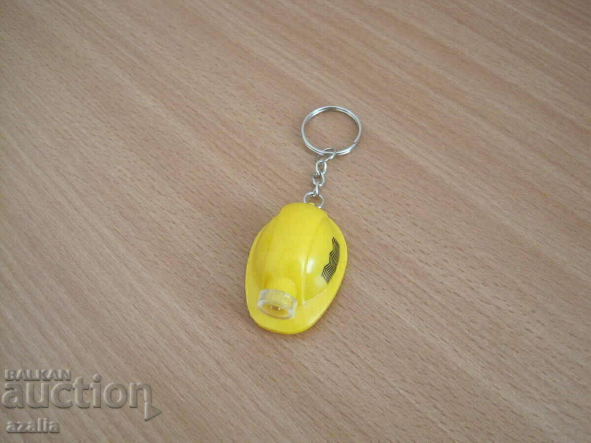 New helmet-shaped keychain with light New helmet-shaped keychain with light