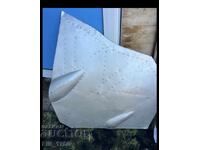 Part of a MiG-25 fighter jet fuselage