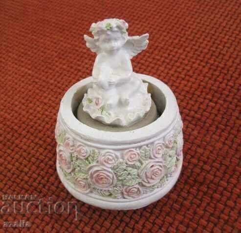 Angel figurine in a music box with price 5.00 BGN | € 2.56 Angel figurine in a music box with price 5.00 BGN | € 2.56