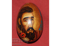 Hand-painted wooden egg icon