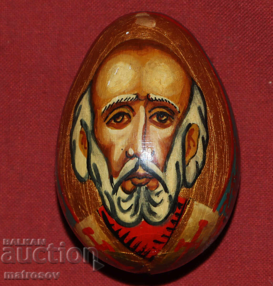 Hand-painted wooden egg icon