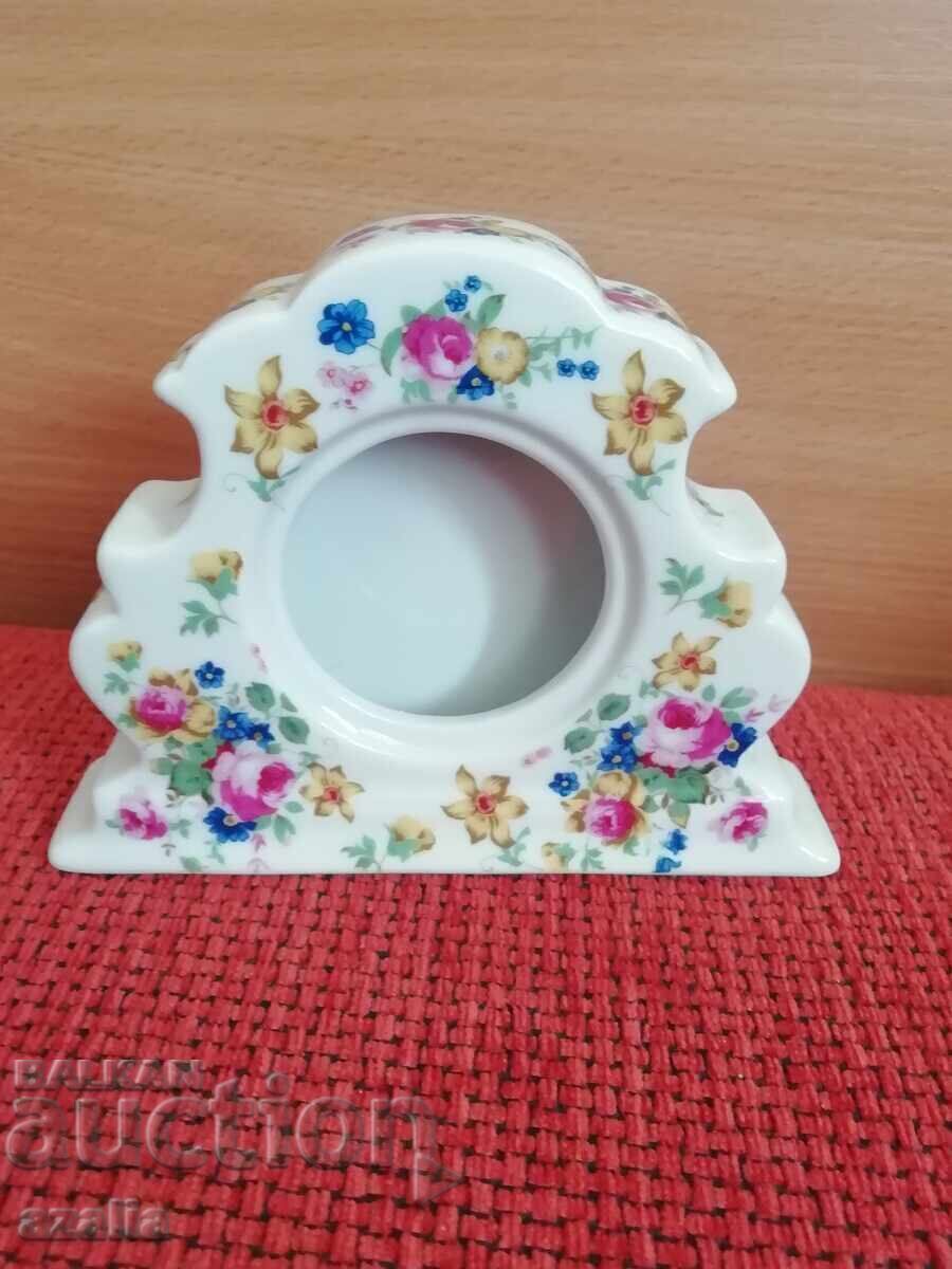 Beautiful porcelain watch stand, photo Beautiful porcelain watch stand, photo