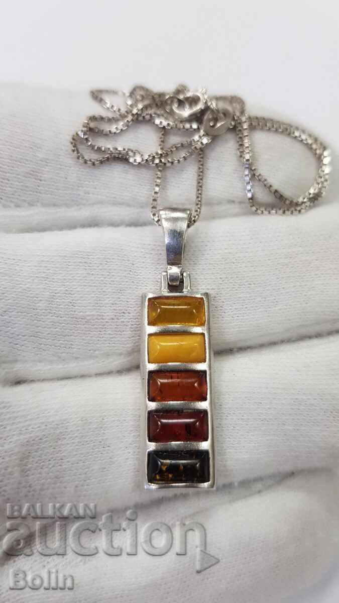 Silver pendant with natural amber 925 silver. Europe Silver pendant with natural amber 925 silver. Europe