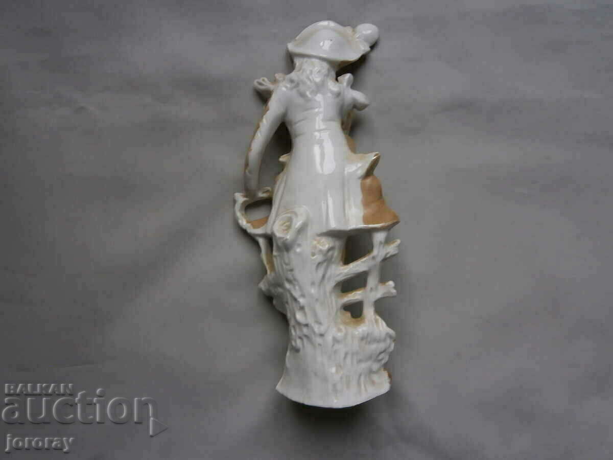 Auction  Porcelain figure 23 cm.