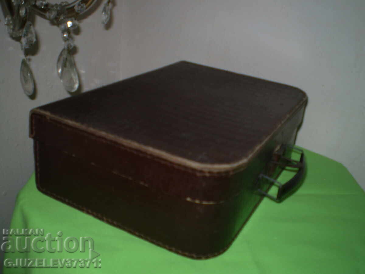 Auction  Old, small cardboard suitcase