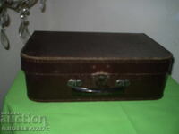 Old, small cardboard suitcase