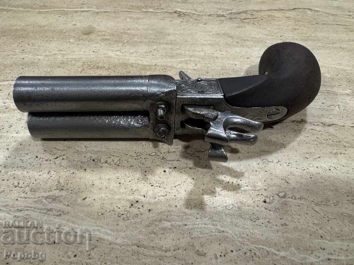 Delivery of Old double-barreled pistol, revolver
