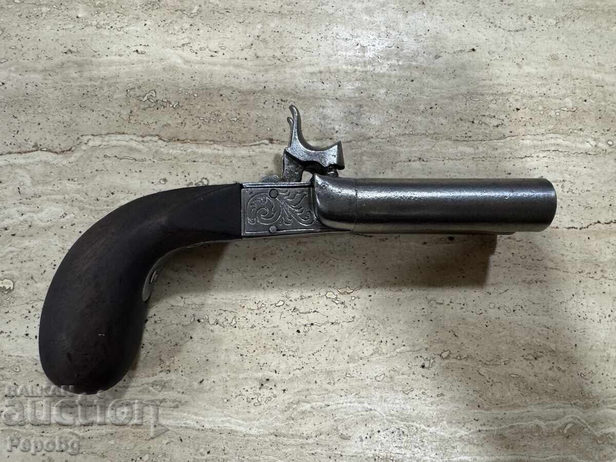 Old double-barreled pistol, revolver