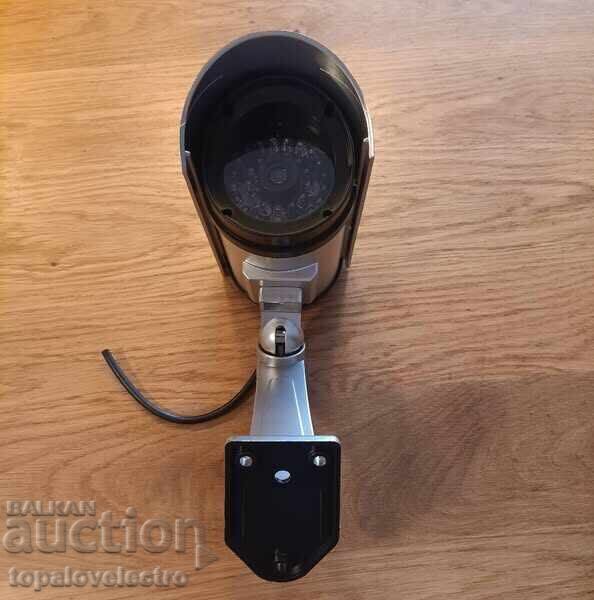 Delivery of NEW! Outdoor Fake Security Camera with Realistic Look