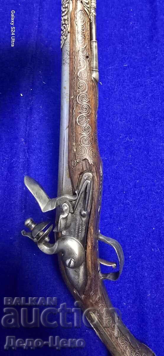 Delivery of Silver Flintlock Pistol