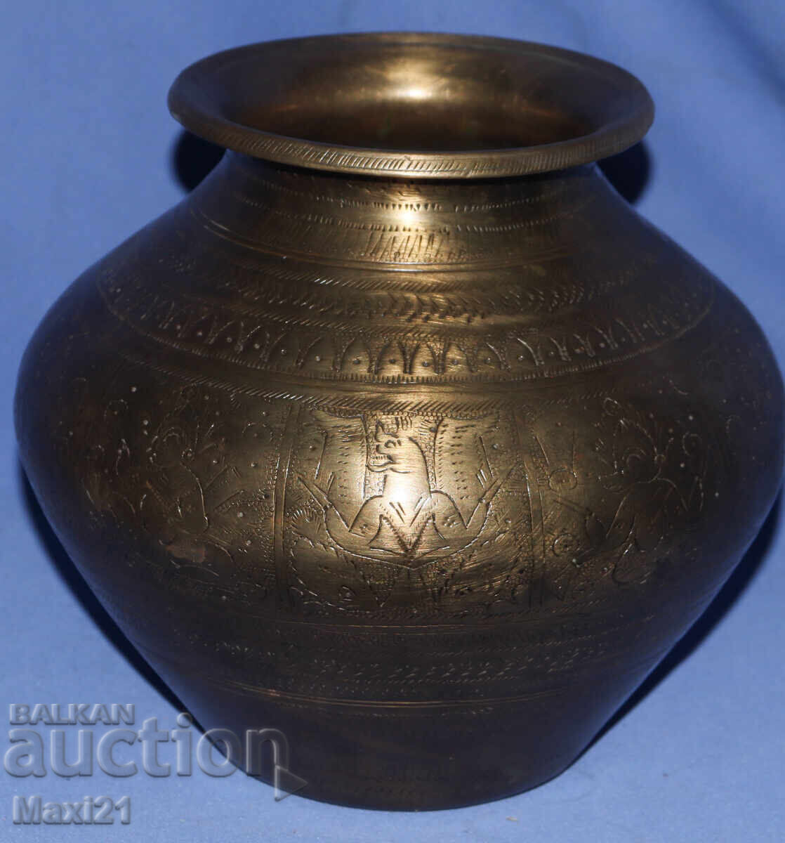 Delivery of Old brass vase with figural motifs