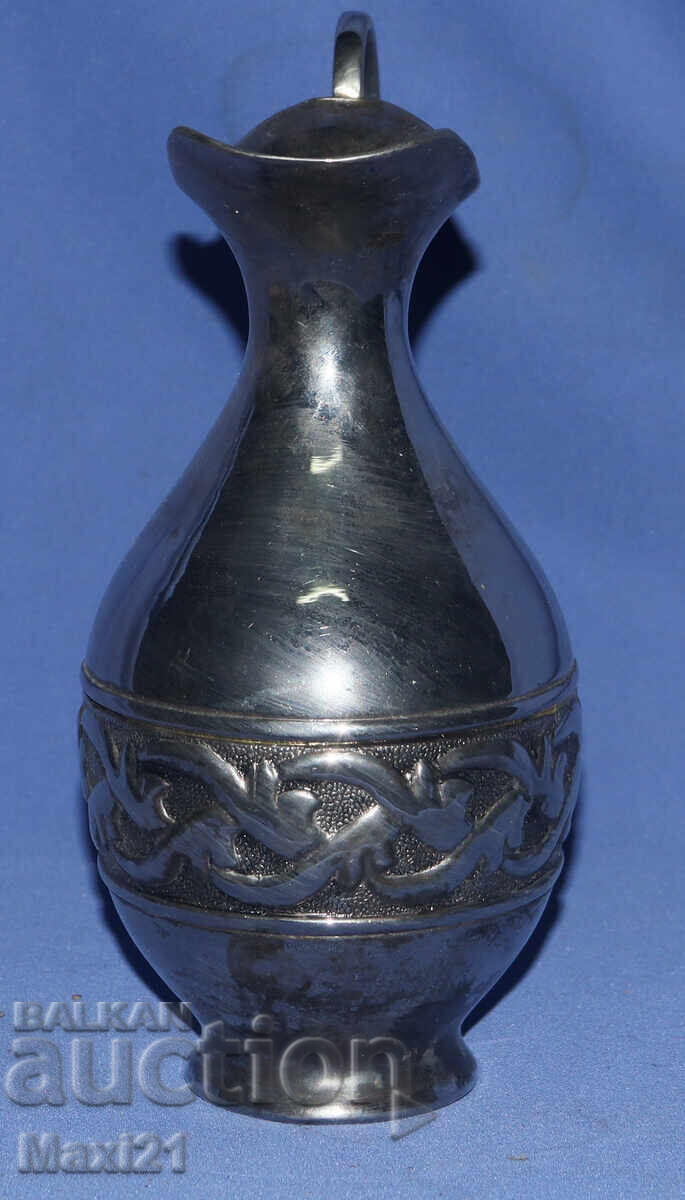 Auction  Vintage silver-plated serving pitcher