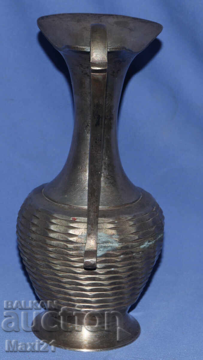 Auction  Vintage silver-plated serving pitcher