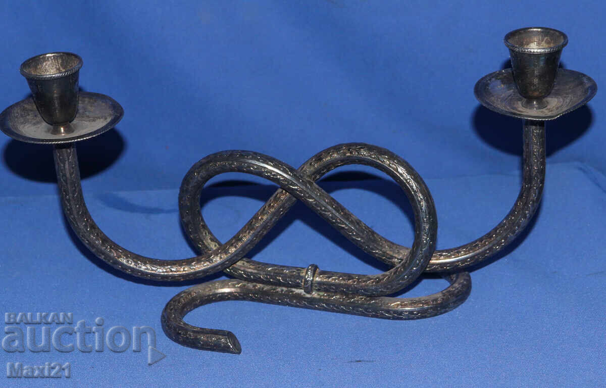 Interesting decorative metal candlestick with price 170.00 BGN | € 86.92