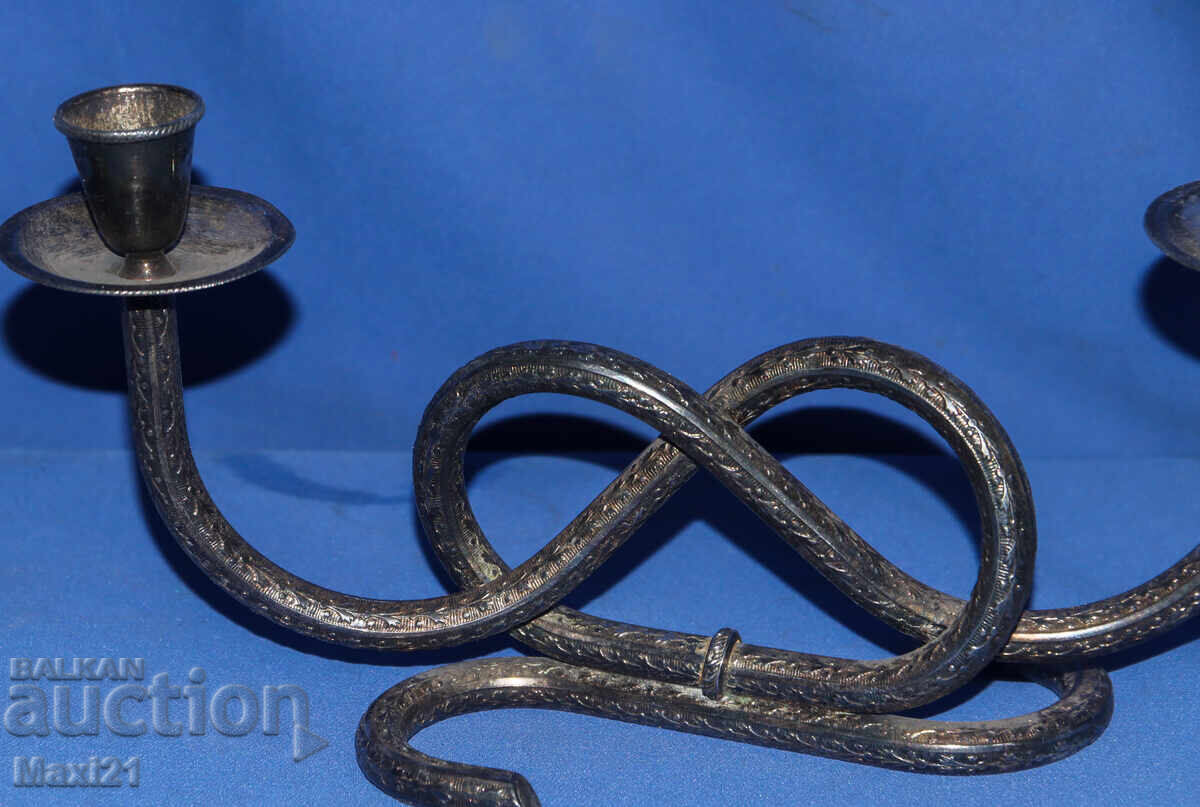 Delivery of Interesting decorative metal candlestick