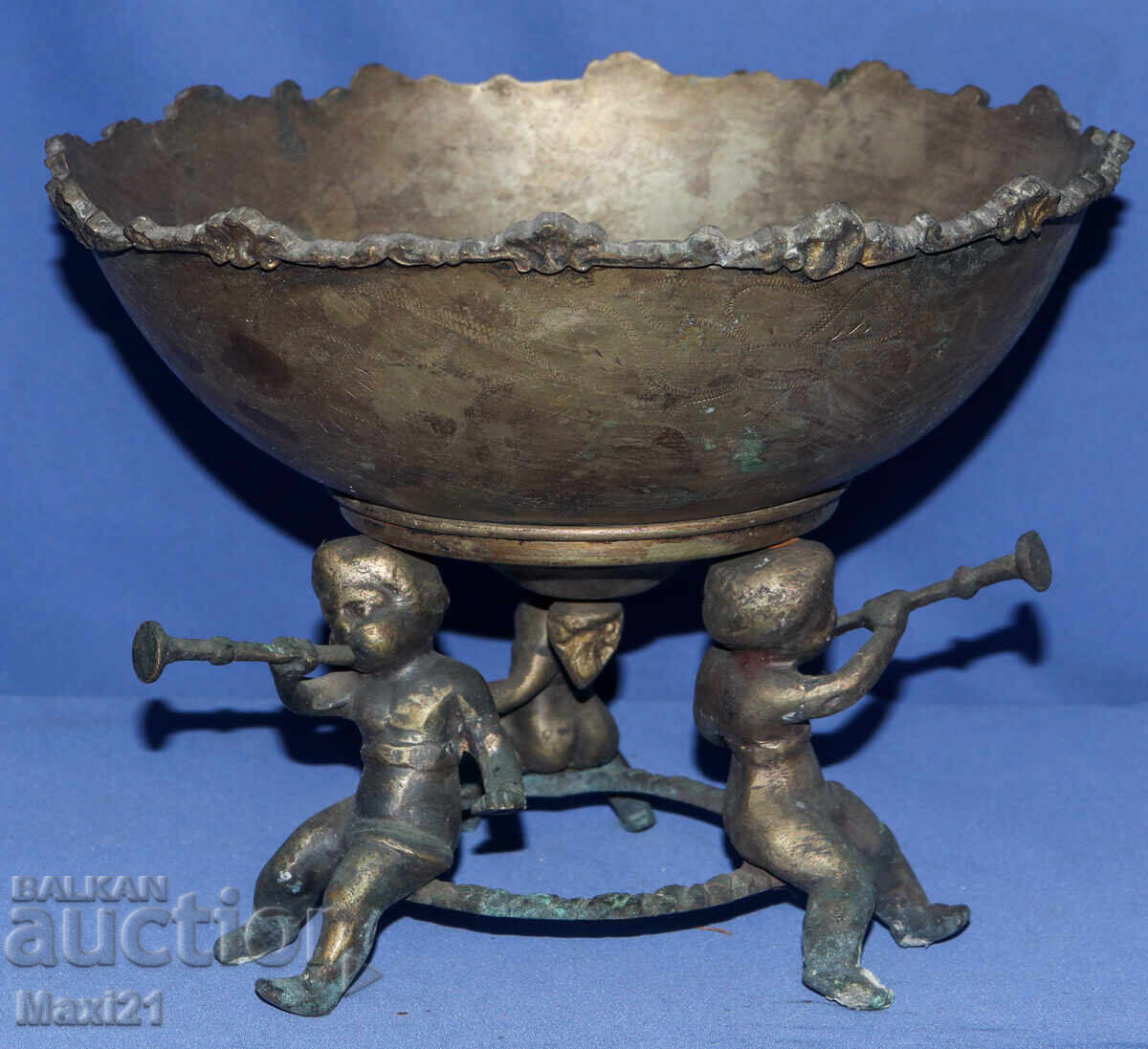 Decorative brass bowl with bronze ornaments